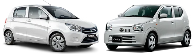 Two white economy hatchbacks